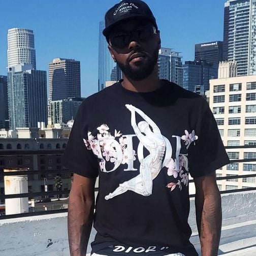 Portrait of Reese El Don on a rooftop.